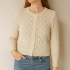 Person using Cream Pointelle-Knit Cardigan