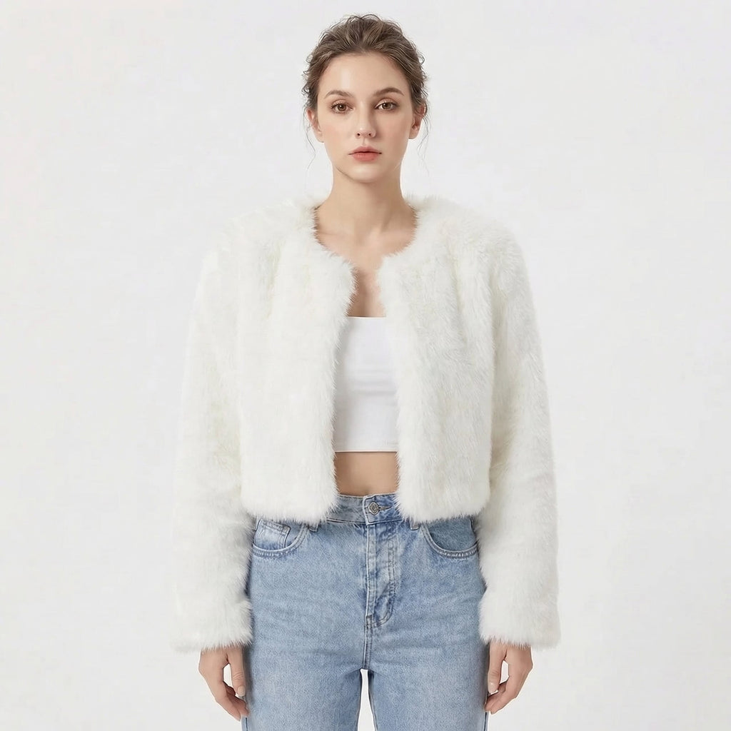 Front view of a model wearing a white cropped faux fur jacket.