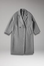 Front view of a grey double-breasted long coat laid flat on a grey background.