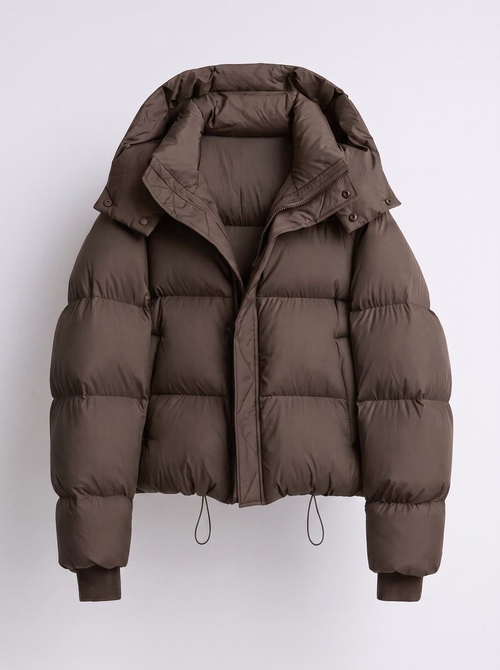 Front view of a brown hooded cropped puffer jacket, laid flat on a white background.
