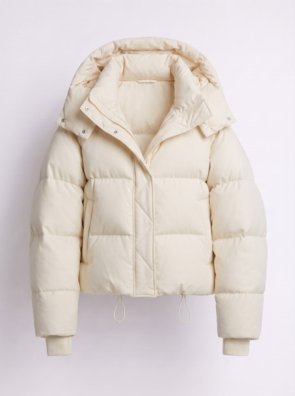 Front view of an off-white hooded cropped puffer jacket, laid flat on a white background.