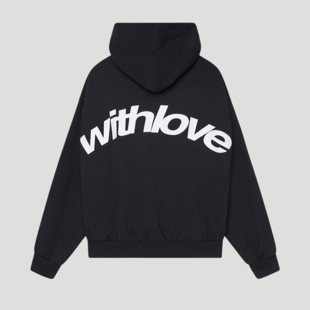 Back view of a black oversized pullover hoodie with a large white 'withlove' graphic print.