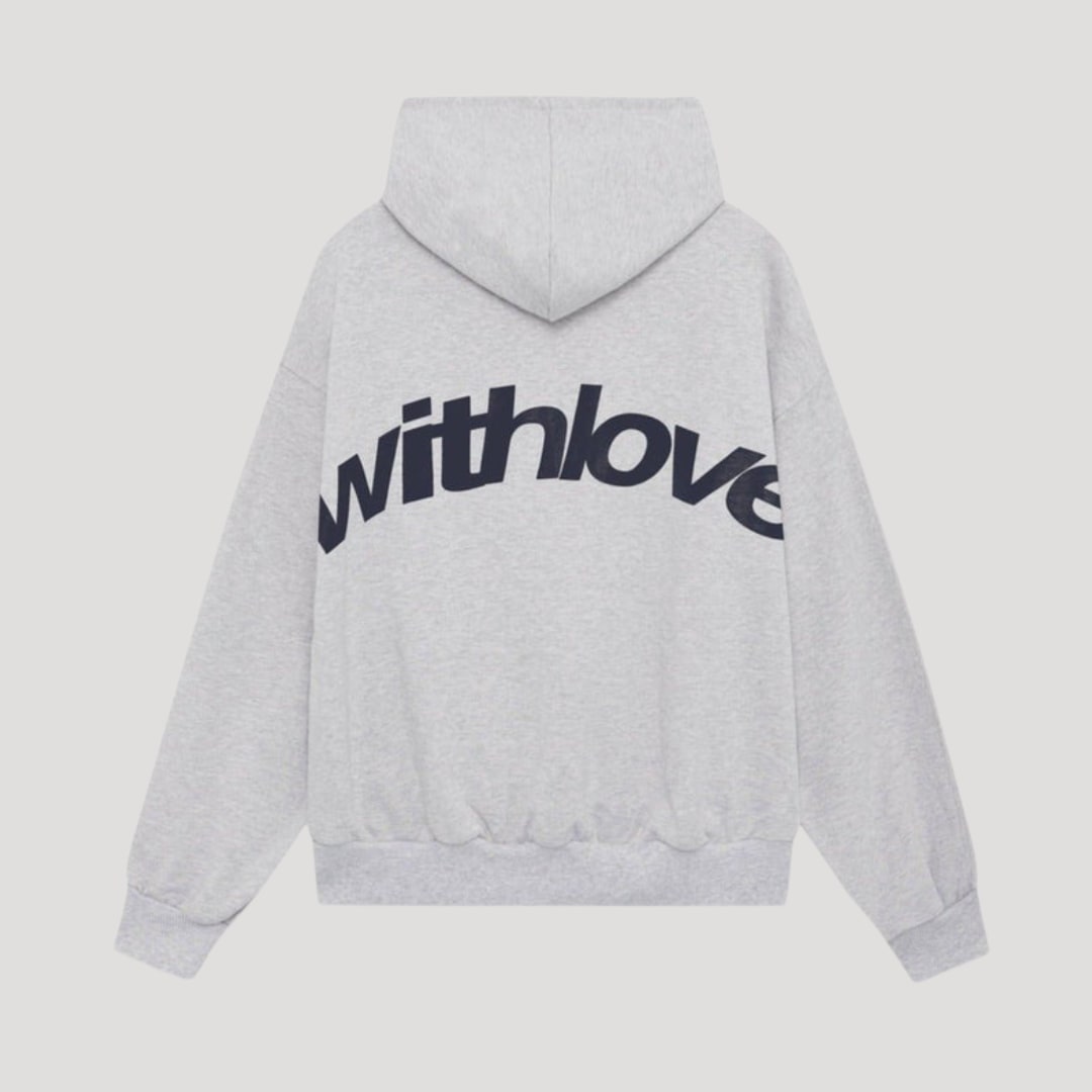 Back view of a light grey oversized pullover hoodie with a large dark 'withlove' graphic print.