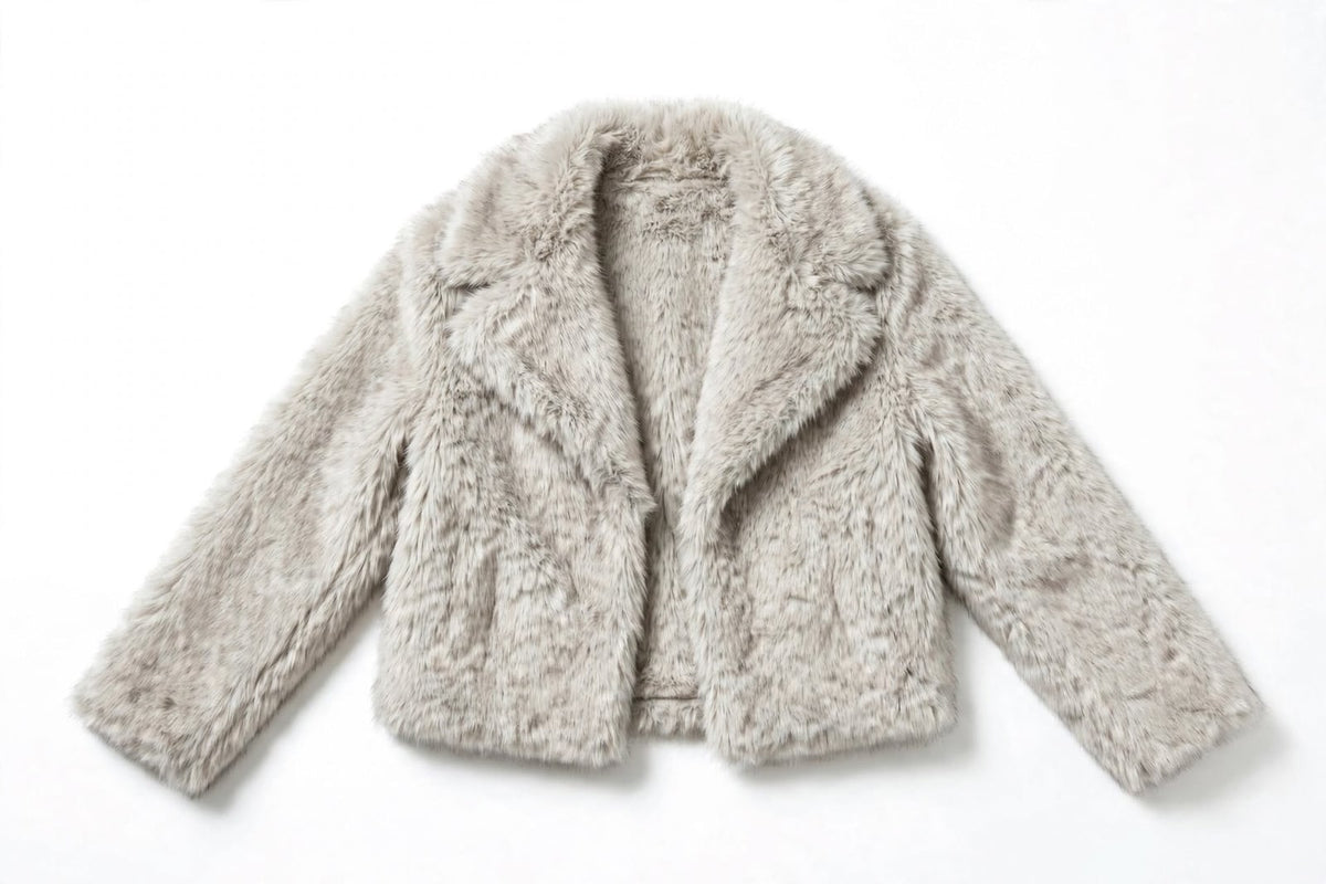 Flat lay front view of a light grey faux fur jacket.